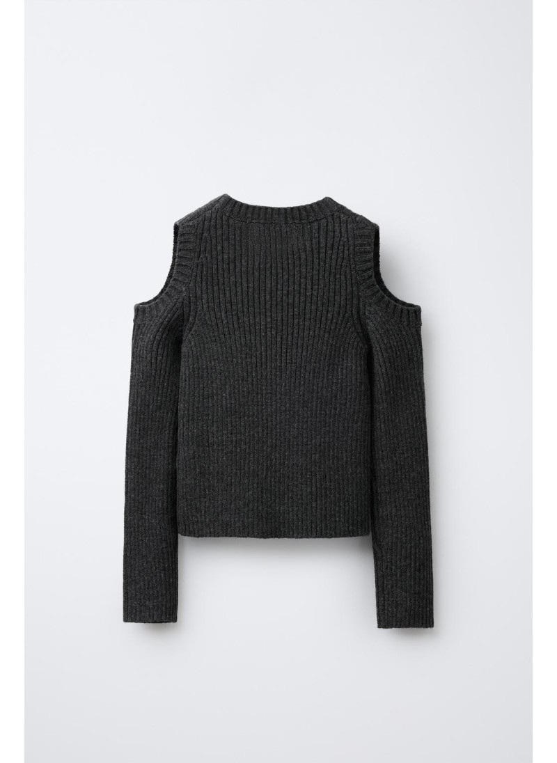 Свитер вязаный с вышитой вырезанной звездой Свитер вязаный с вышитой вырезанной звездой