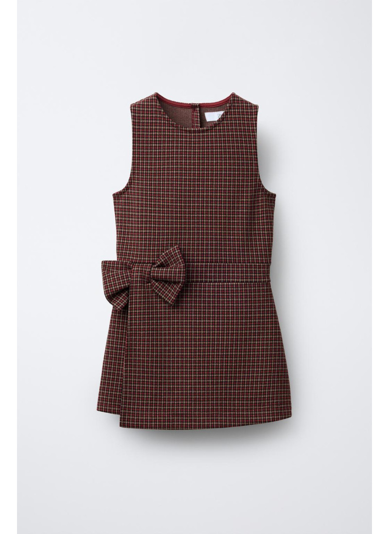 Шорты-комбинезон с клетчатым узелком Шорты-комбинезон с клетчатым узелком