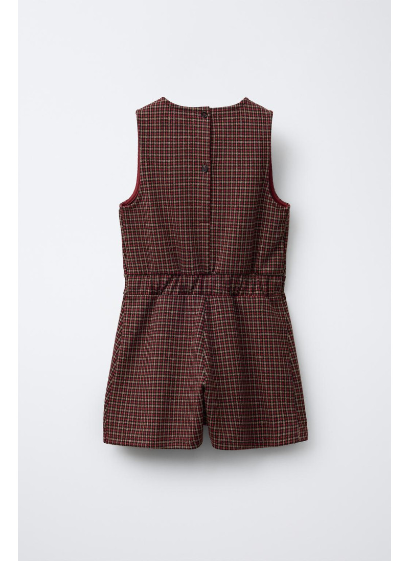 Шорты-комбинезон с клетчатым узелком Шорты-комбинезон с клетчатым узелком