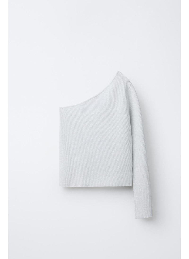 Светлый асимметричный свитер с блеском Светлый асимметричный свитер с блеском