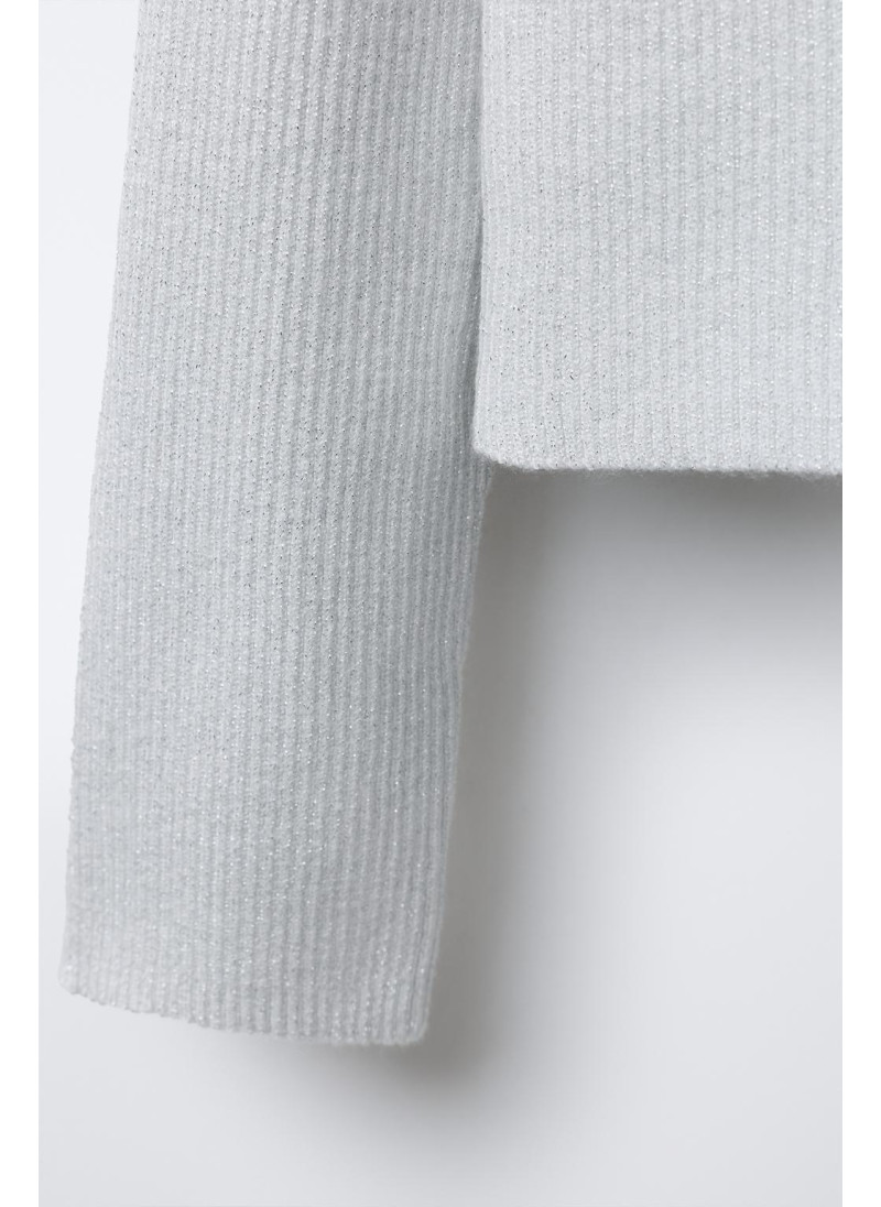 Светлый асимметричный свитер с блеском Светлый асимметричный свитер с блеском