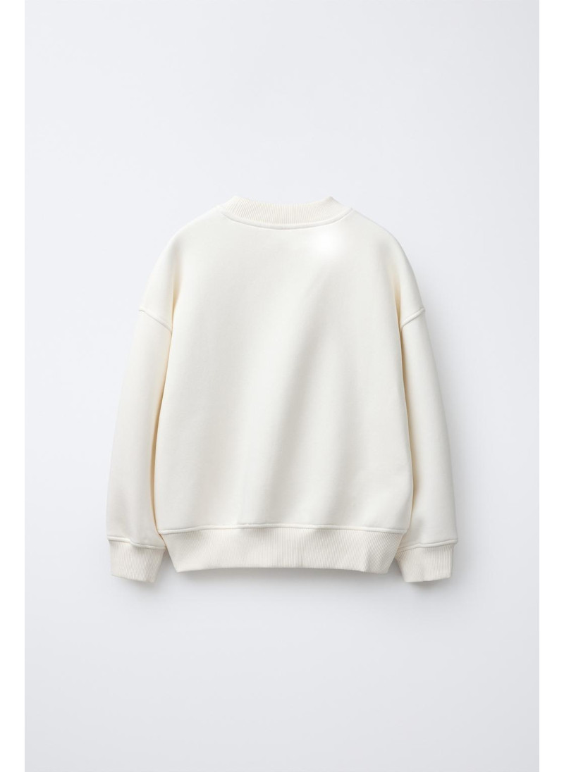 ТОЛСТОВКА С БАНТАМИ И ПАЙЕТКАМИ ТОЛСТОВКА С БАНТАМИ И ПАЙЕТКАМИ