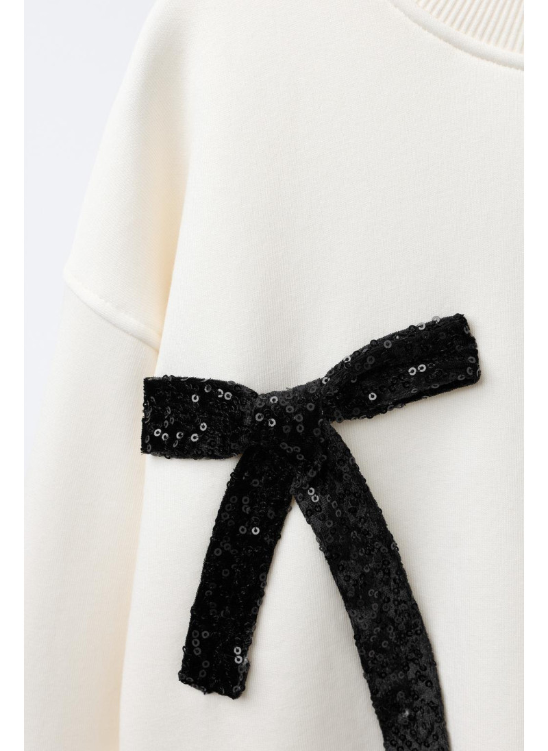 ТОЛСТОВКА С БАНТАМИ И ПАЙЕТКАМИ ТОЛСТОВКА С БАНТАМИ И ПАЙЕТКАМИ