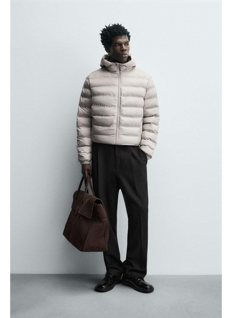 Пуховик легкий с водооттал�...