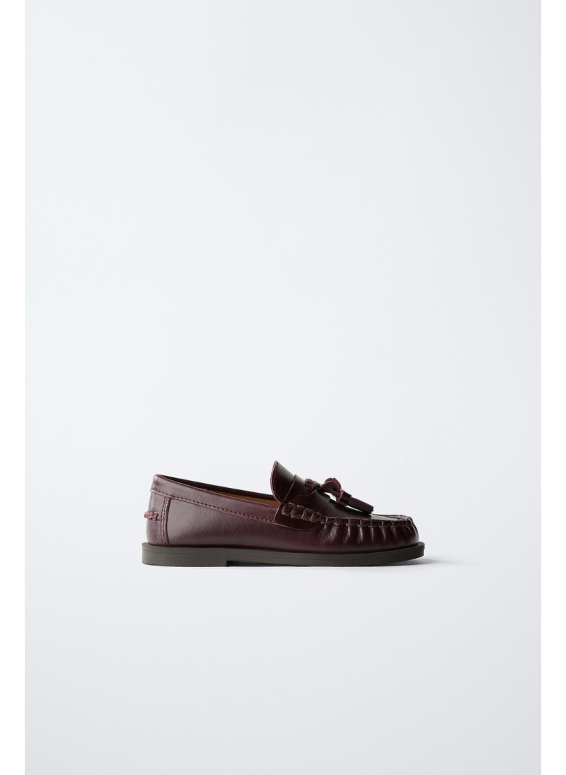 Лоферы с кисточкой из огран...