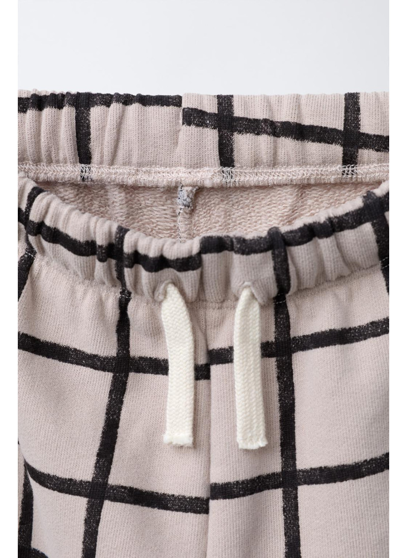 Широкие брюки из флиса в клетку Широкие брюки из флиса в клетку