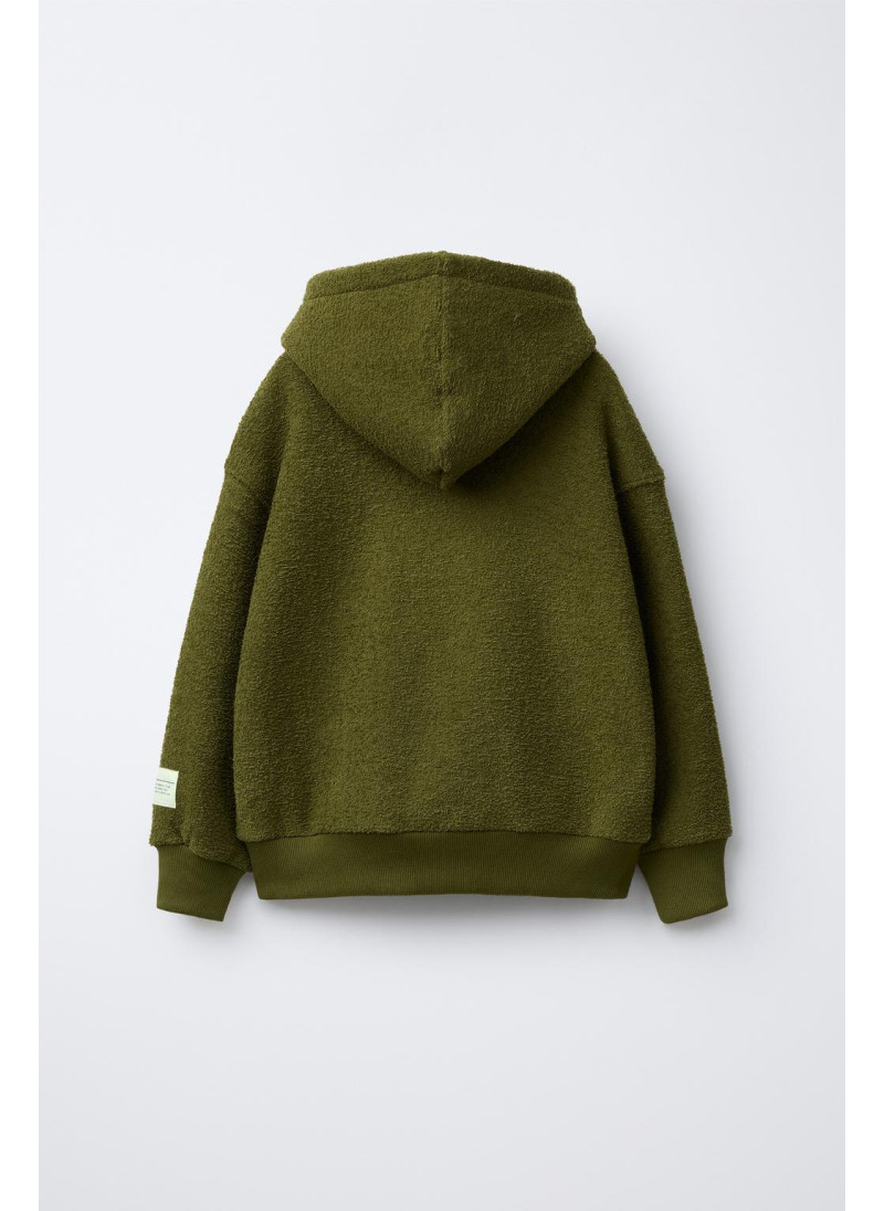 Костюм-двойка с худи и брюками-джоггерами в текстильной текстуре Костюм-двойка с худи и брюками-джоггерами в текстильной текстуре