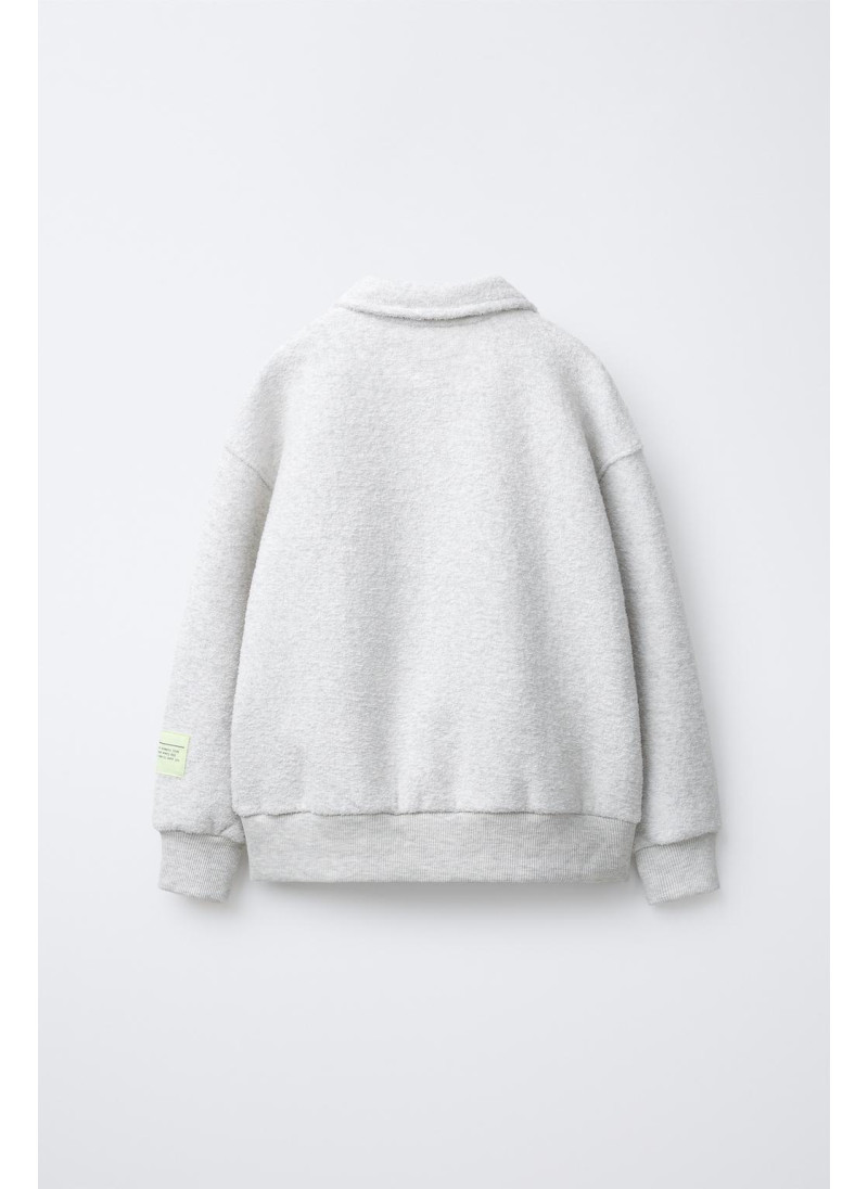 Набор поло и широких брюк с текстурой Набор поло и широких брюк с текстурой