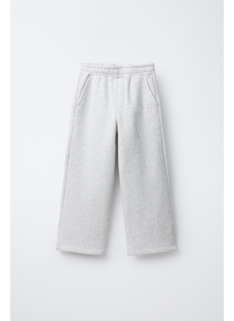 Набор поло и широких брюк с текстурой Набор поло и широких брюк с текстурой