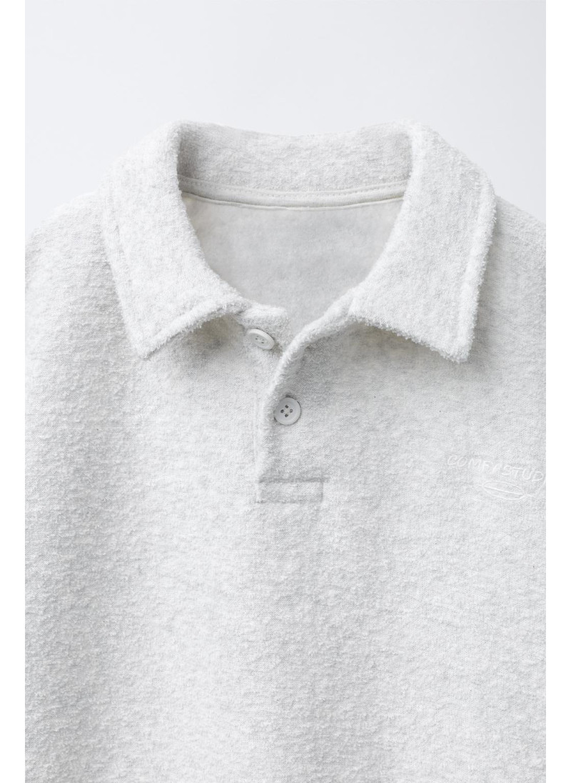 Набор поло и широких брюк с текстурой Набор поло и широких брюк с текстурой