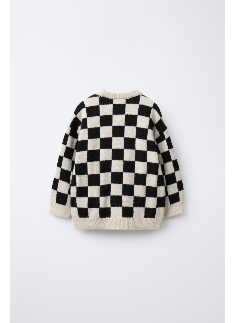 Вязаный свитер в клетку Вязаный свитер в клетку