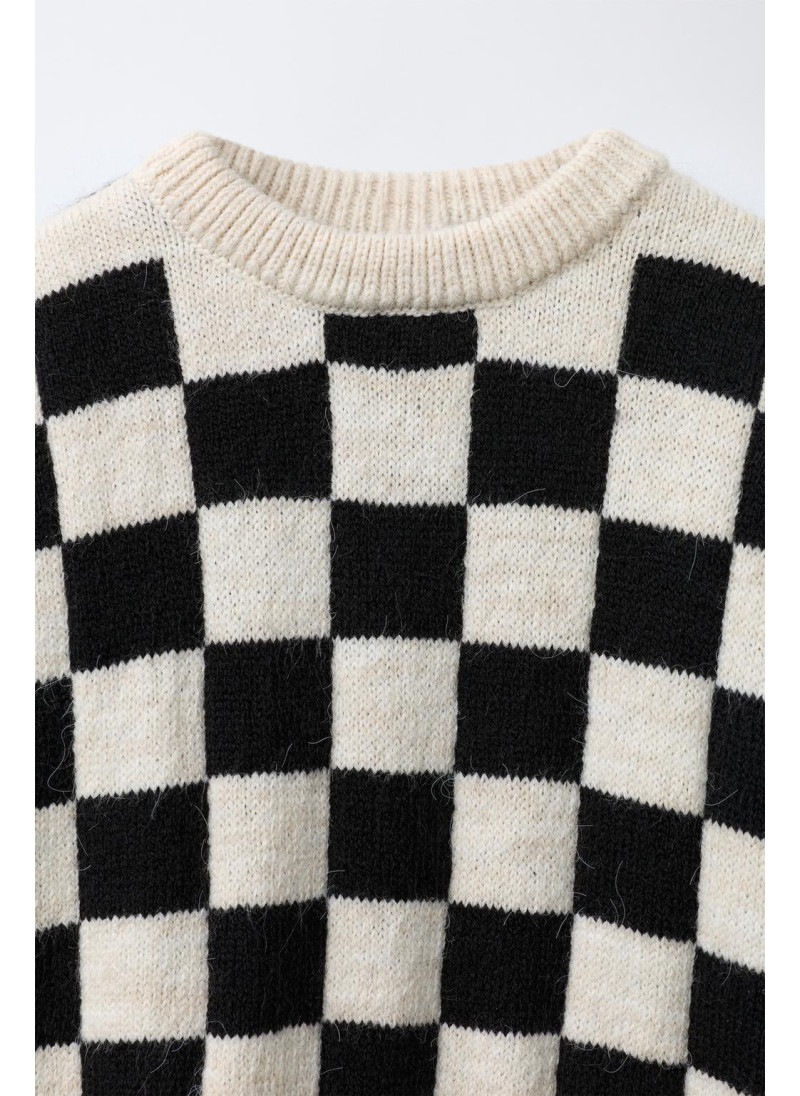 Вязаный свитер в клетку Вязаный свитер в клетку