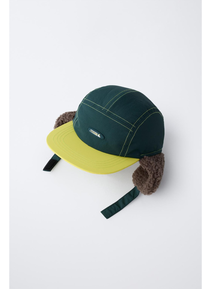 Кепка коллекции лыжной одежды из искусственного меха Кепка коллекции лыжной одежды из искусственного меха