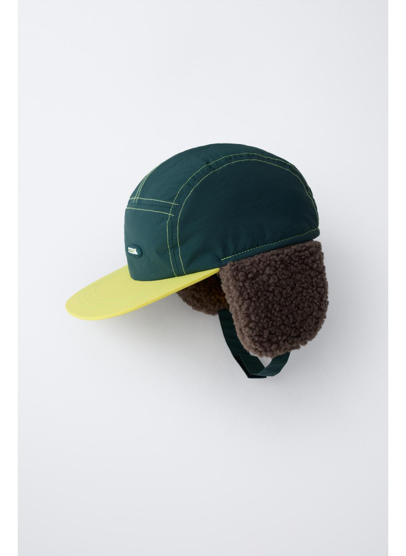 Кепка коллекции лыжной одежды из искусственного меха Кепка коллекции лыжной одежды из искусственного меха