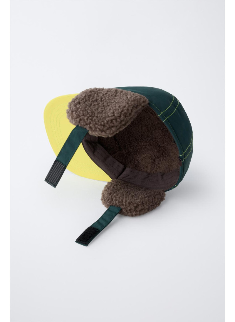 Кепка коллекции лыжной одежды из искусственного меха Кепка коллекции лыжной одежды из искусственного меха