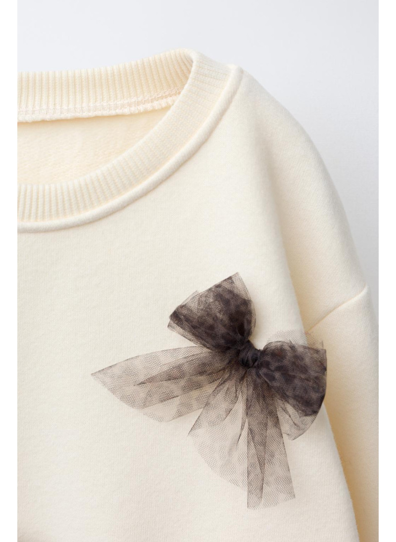 ТОЛСТОВКА С ТЮЛЕВЫМИ БАНТИКАМИ ТОЛСТОВКА С ТЮЛЕВЫМИ БАНТИКАМИ