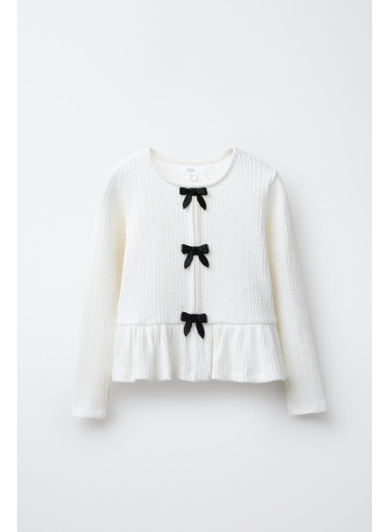 ФУТБОЛКА В РУБЧИК SOFT TOUCH С БАНТАМИ ФУТБОЛКА В РУБЧИК SOFT TOUCH С БАНТАМИ