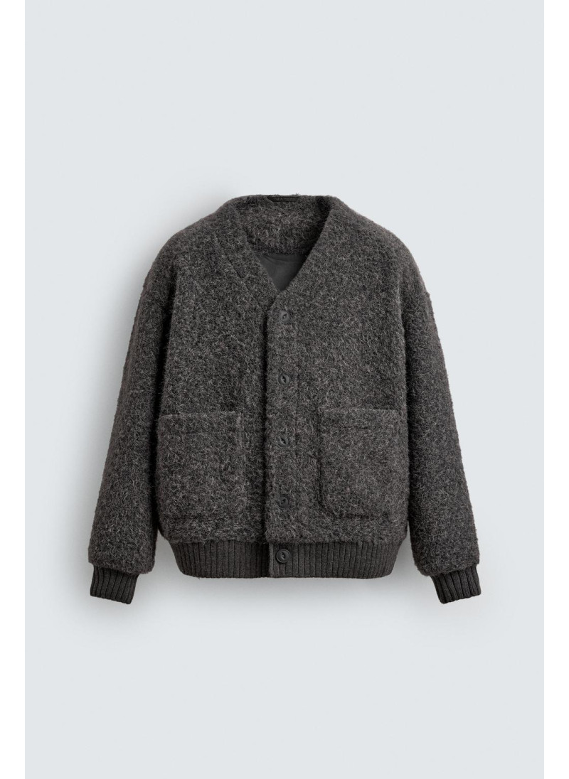 КАРДИГАН ИЗ РЕЛЬЕФНОЙ ТКАНИ С КАРМАНАМИ КАРДИГАН ИЗ РЕЛЬЕФНОЙ ТКАНИ С КАРМАНАМИ