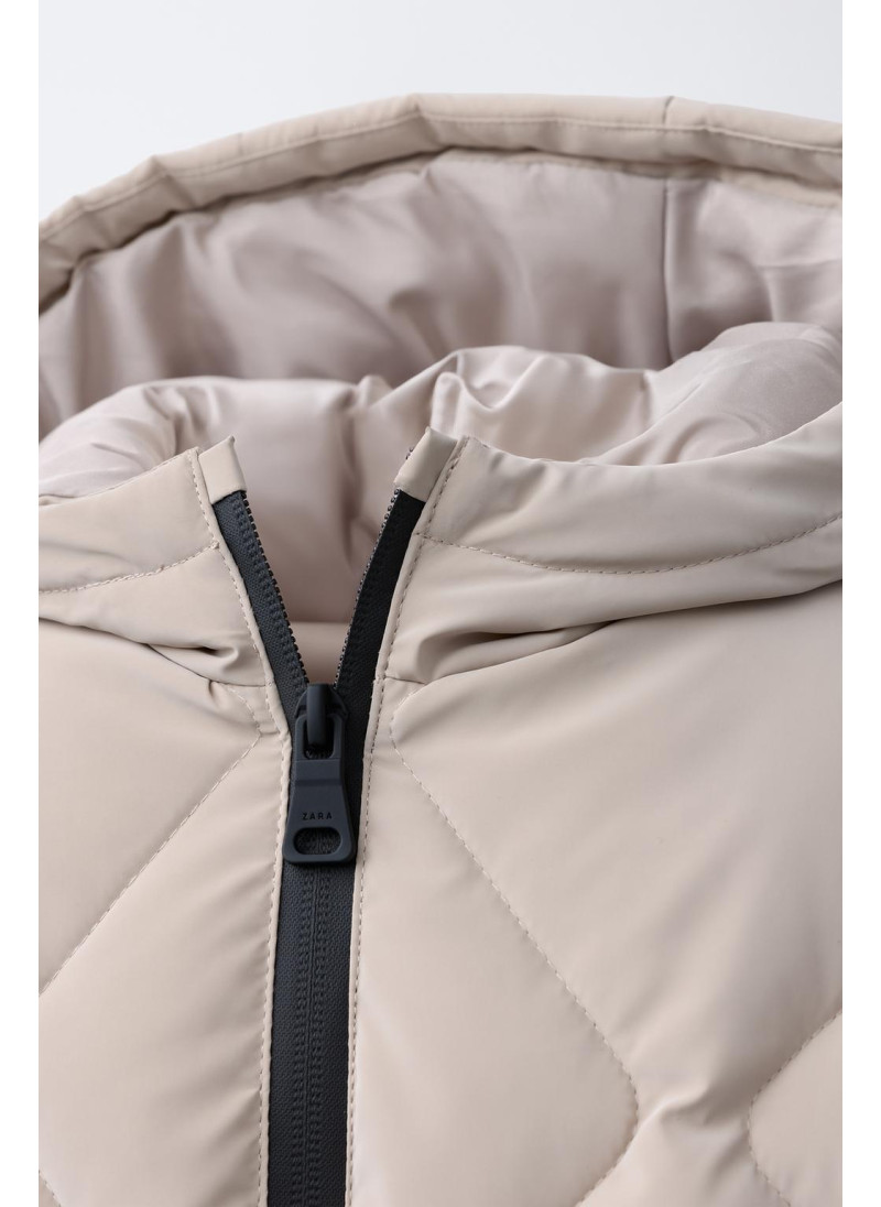 ДЛИННОЕ СТЕГАНОЕ ПАЛЬТО С РЕЗИНОВЫМ ПОКРЫТИЕМ ДЛИННОЕ СТЕГАНОЕ ПАЛЬТО С РЕЗИНОВЫМ ПОКРЫТИЕМ