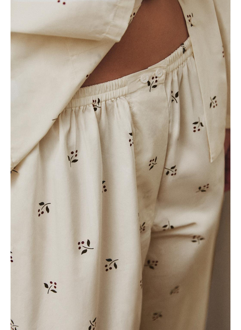 Штаны с рождественским принтом листьев Штаны с рождественским принтом листьев