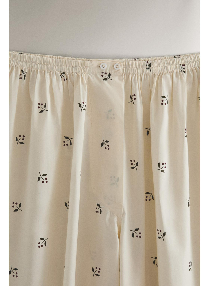 Штаны с рождественским принтом листьев Штаны с рождественским принтом листьев