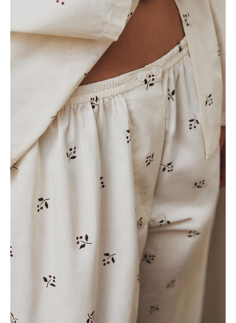 Штаны с рождественским принтом листьев Штаны с рождественским принтом листьев