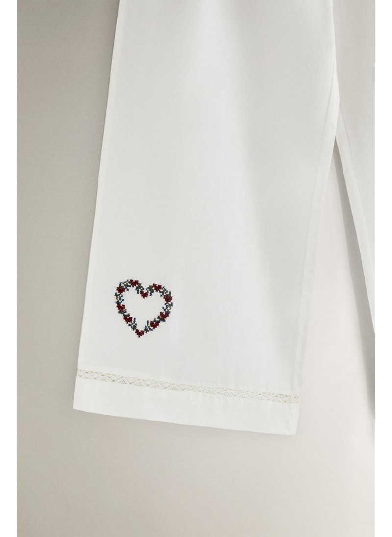 Вышитые рождественские штаны Вышитые рождественские штаны