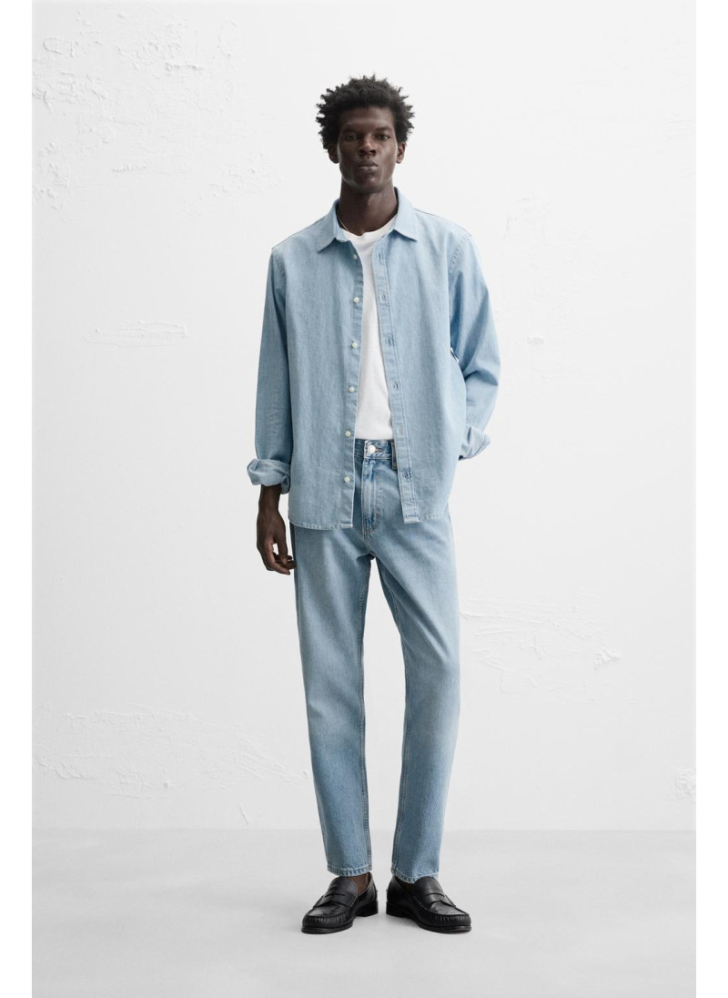 Джинсы с узкими бедрами и зауженными штанинами Джинсы с узкими бедрами и зауженными штанинами