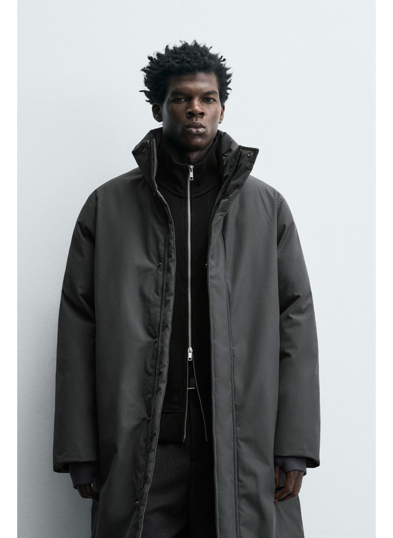 Длинный стеганый пуховик Длинный стеганый пуховик