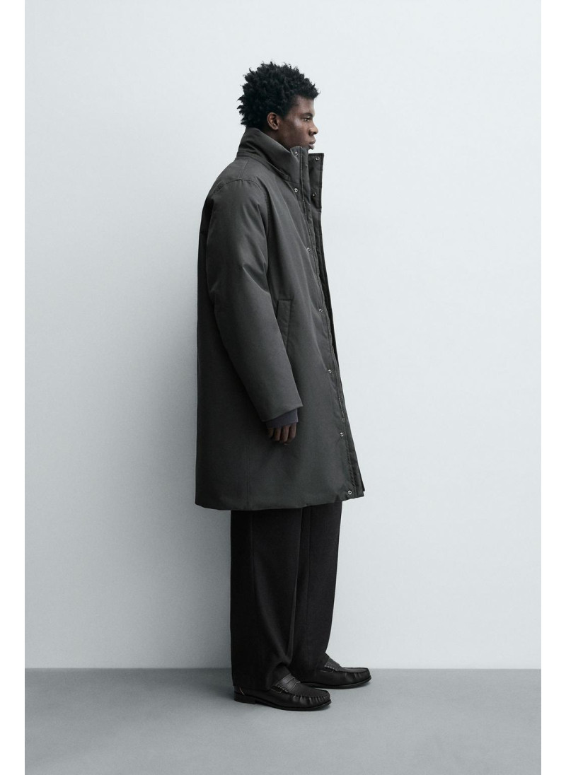 Длинный стеганый пуховик Длинный стеганый пуховик