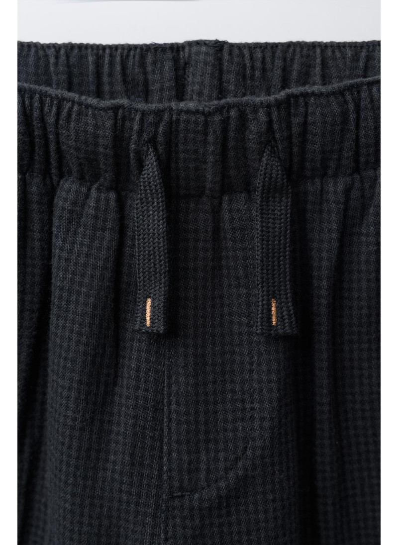 Брюки в клетку Брюки в клетку