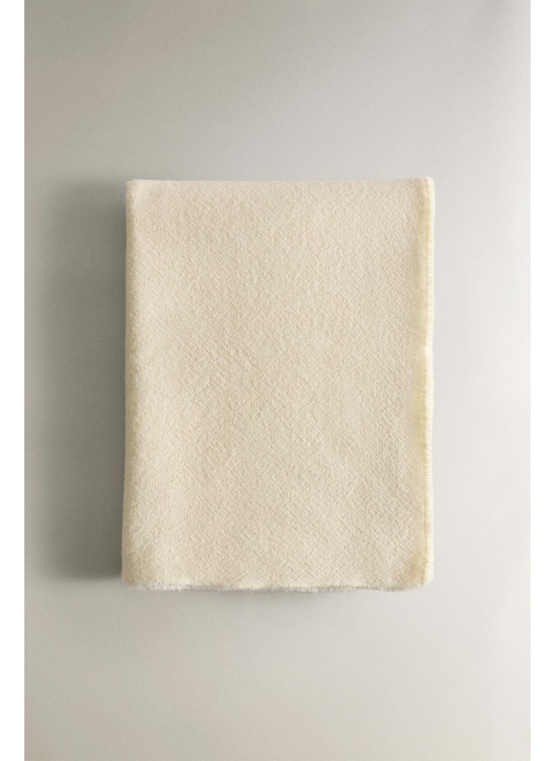 Плед с объемными кисточками Плед с объемными кисточками