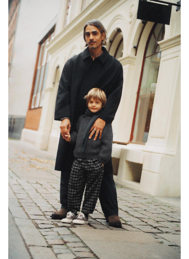 Брюки в клетку с зауженным �...