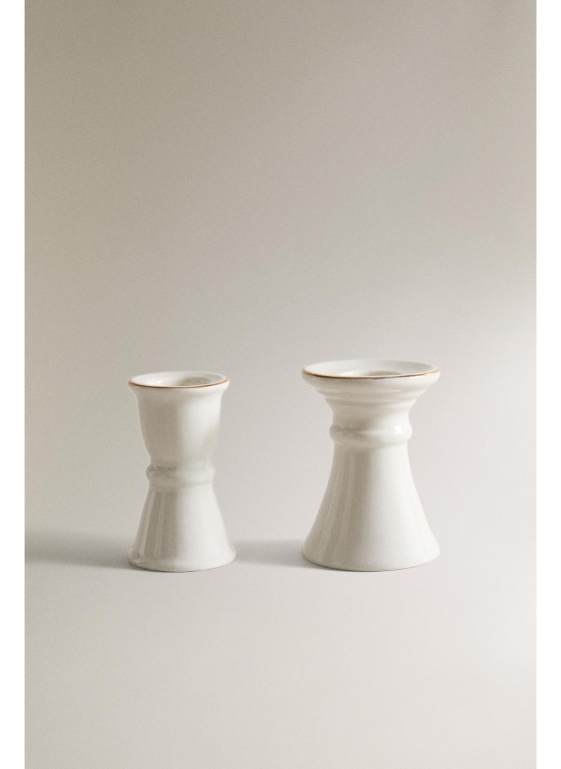 Фарфоровый подсвечник для �...