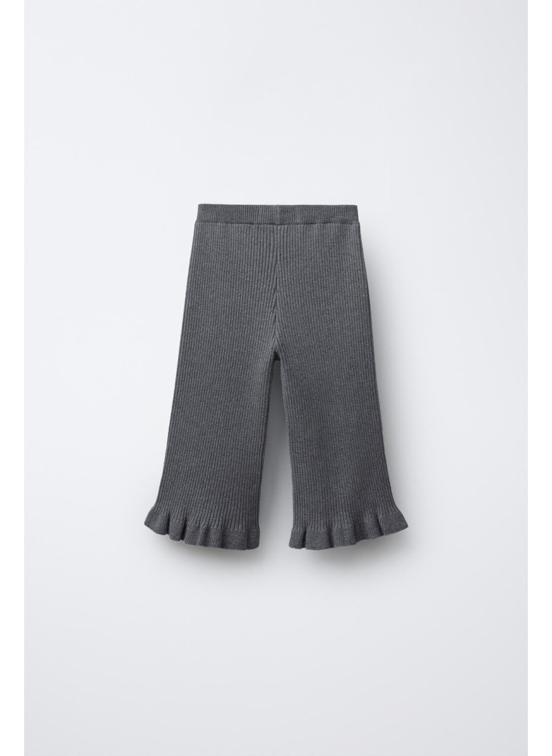 ТРИКОТАЖНЫЕ БРЮКИ С ВОЛАНАМИ ТРИКОТАЖНЫЕ БРЮКИ С ВОЛАНАМИ