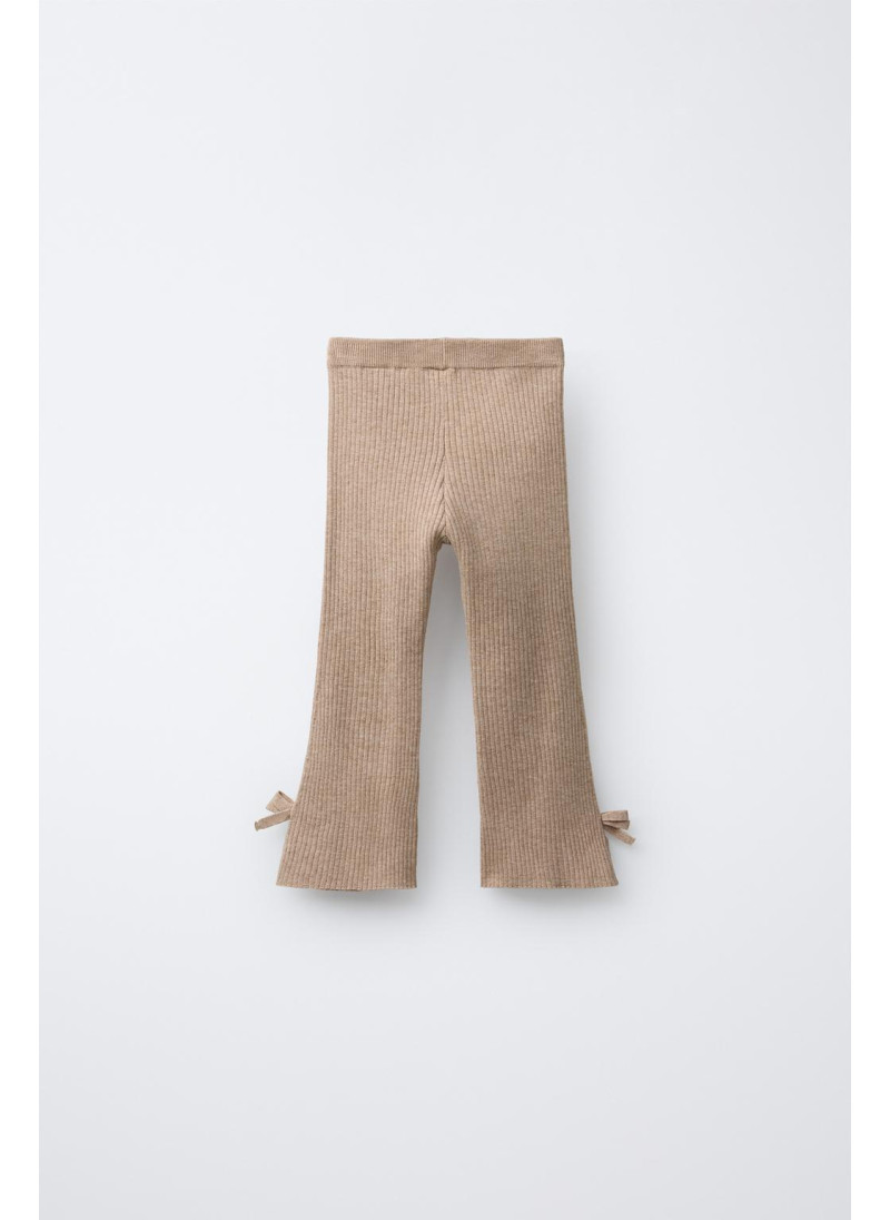 РАСКЛЕШЕННЫЕ ТРИКОТАЖНЫЕ ЛЕГИНСЫ С БАНТИКАМИ РАСКЛЕШЕННЫЕ ТРИКОТАЖНЫЕ ЛЕГИНСЫ С БАНТИКАМИ