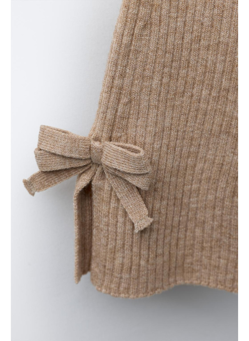 РАСКЛЕШЕННЫЕ ТРИКОТАЖНЫЕ ЛЕГИНСЫ С БАНТИКАМИ РАСКЛЕШЕННЫЕ ТРИКОТАЖНЫЕ ЛЕГИНСЫ С БАНТИКАМИ