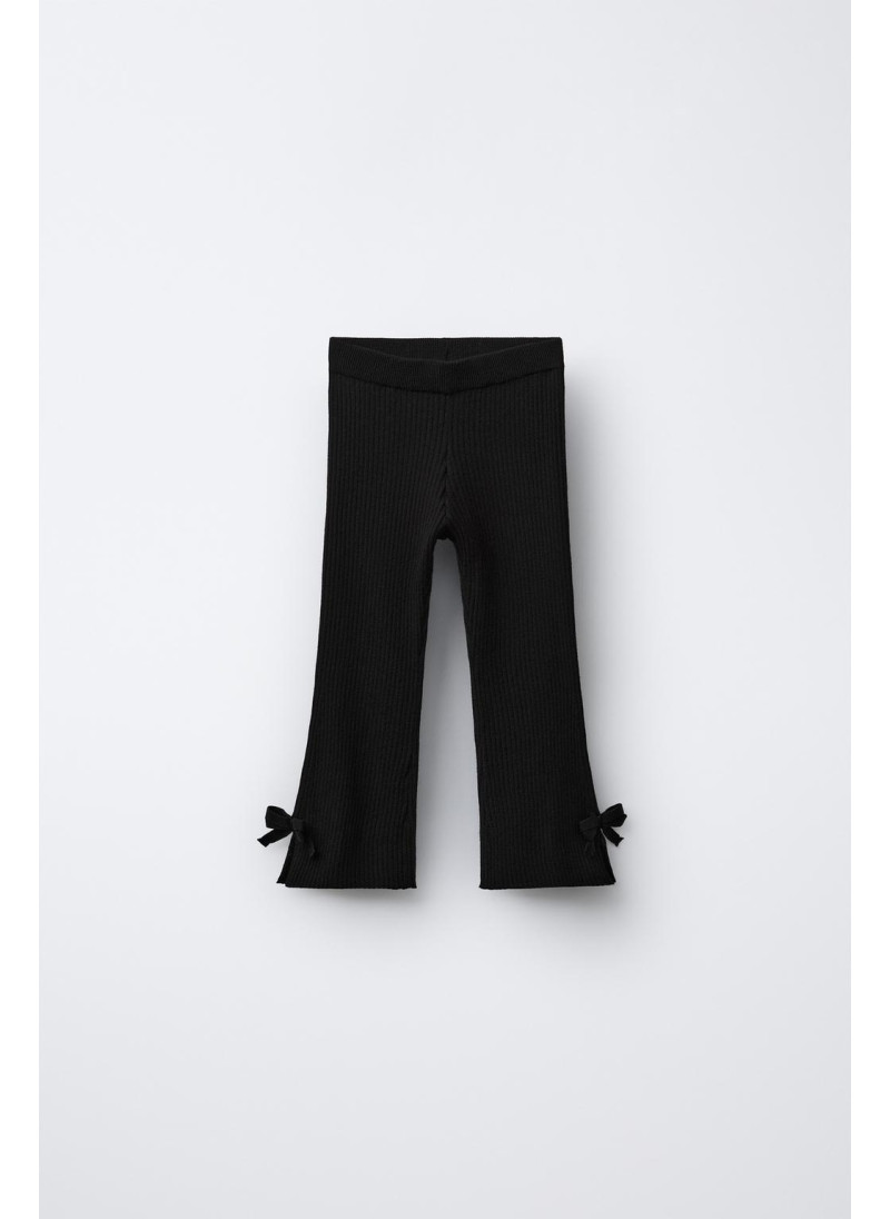 РАСКЛЕШЕННЫЕ ТРИКОТАЖНЫЕ ЛЕГИНСЫ С БАНТИКАМИ РАСКЛЕШЕННЫЕ ТРИКОТАЖНЫЕ ЛЕГИНСЫ С БАНТИКАМИ