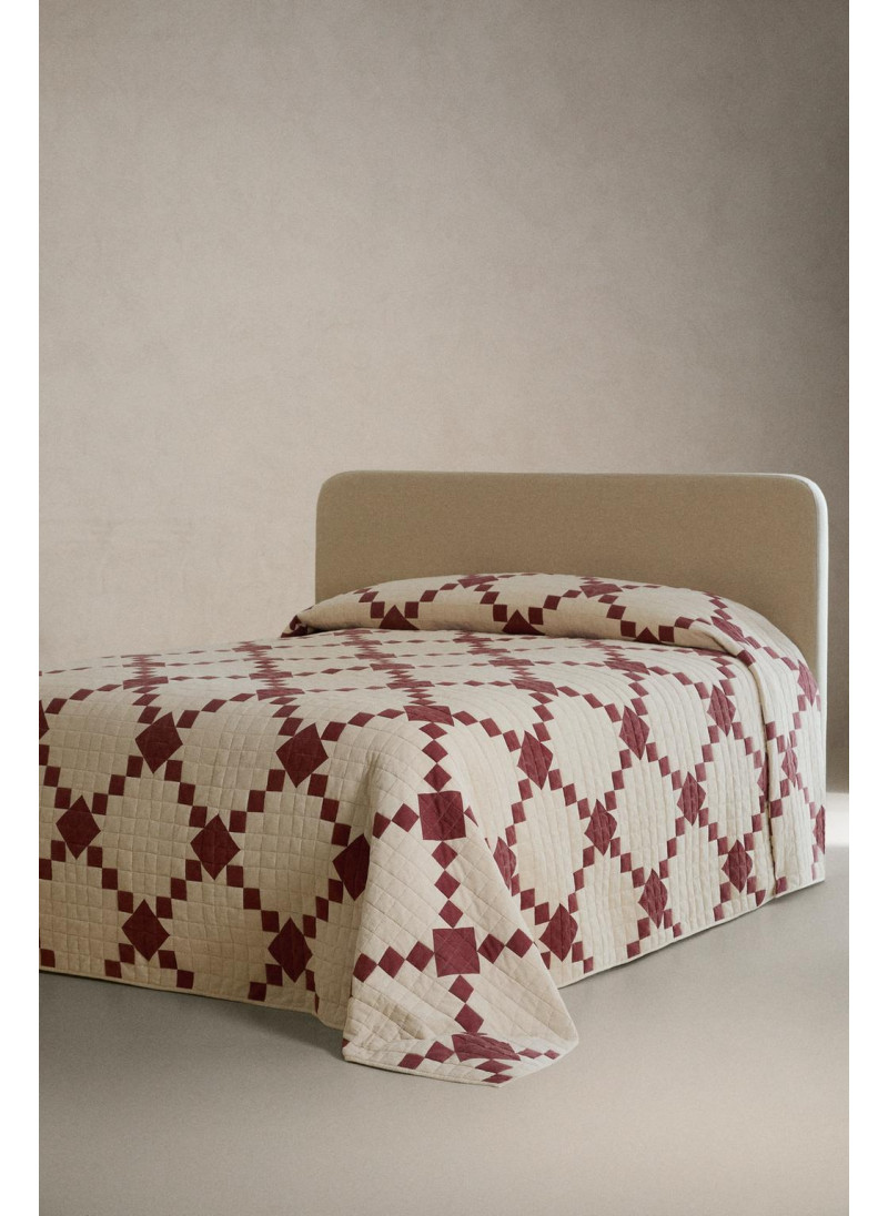 Стёганое рождественское одеяло из пэчворк-дизайна Стёганое рождественское одеяло из пэчворк-дизайна