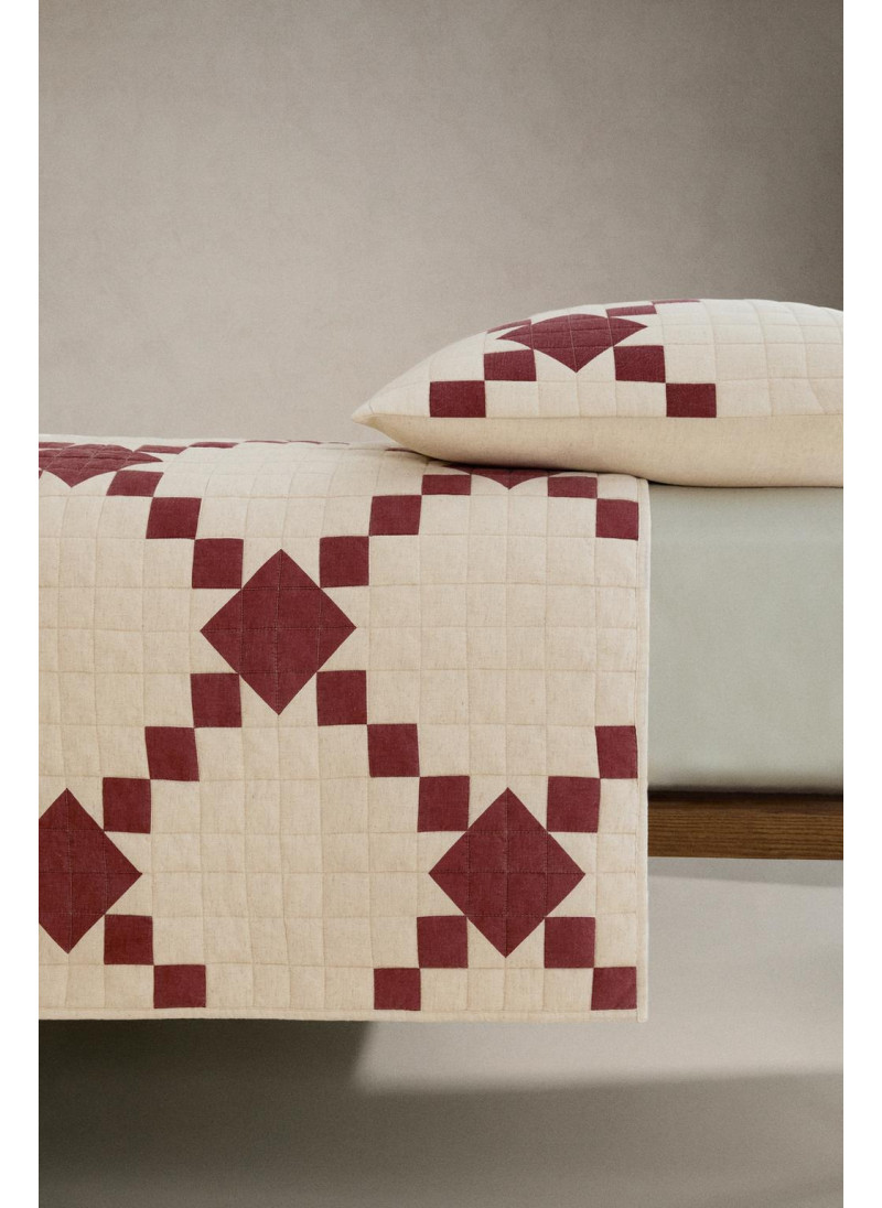 Стёганое рождественское одеяло из пэчворк-дизайна Стёганое рождественское одеяло из пэчворк-дизайна