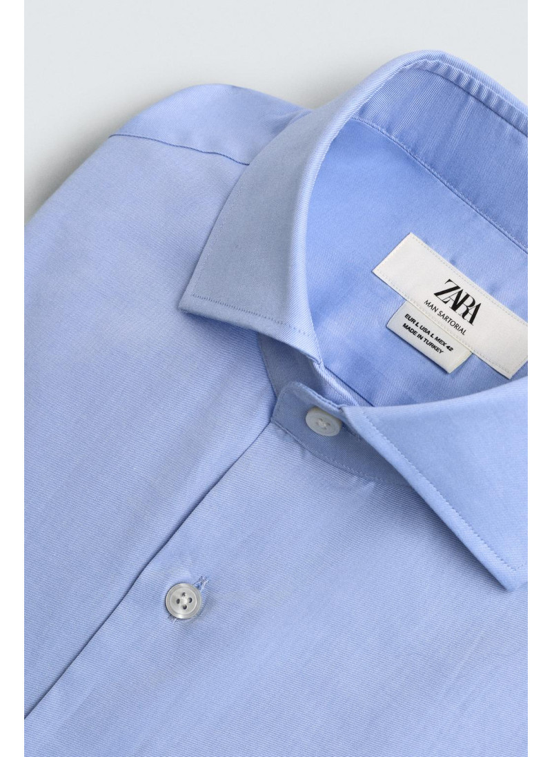 РУБАШКА ИЗ РЕЛЬЕФНОЙ ТКАНИ С МАНЖЕТАМИ ПОД ЗАПОНКИ РУБАШКА ИЗ РЕЛЬЕФНОЙ ТКАНИ С МАНЖЕТАМИ ПОД ЗАПОНКИ