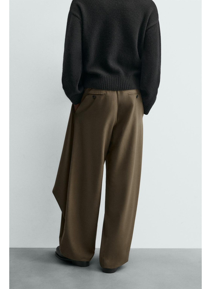 Лимитированная коллекция драпированных перекрещенных брюк Лимитированная коллекция драпированных перекрещенных брюк