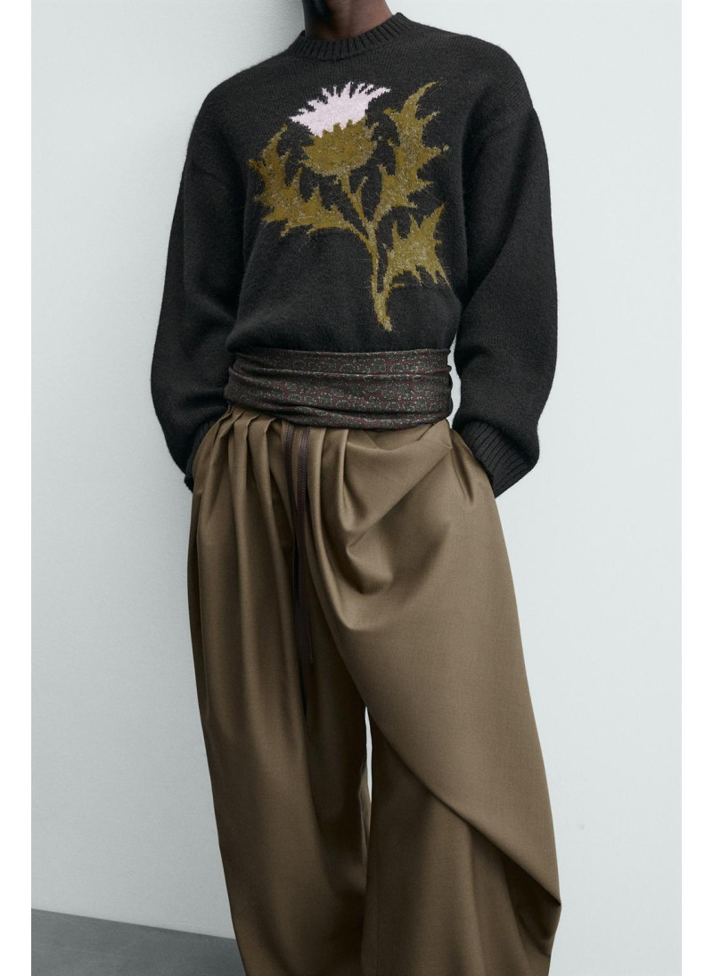 Лимитированная коллекция драпированных перекрещенных брюк Лимитированная коллекция драпированных перекрещенных брюк