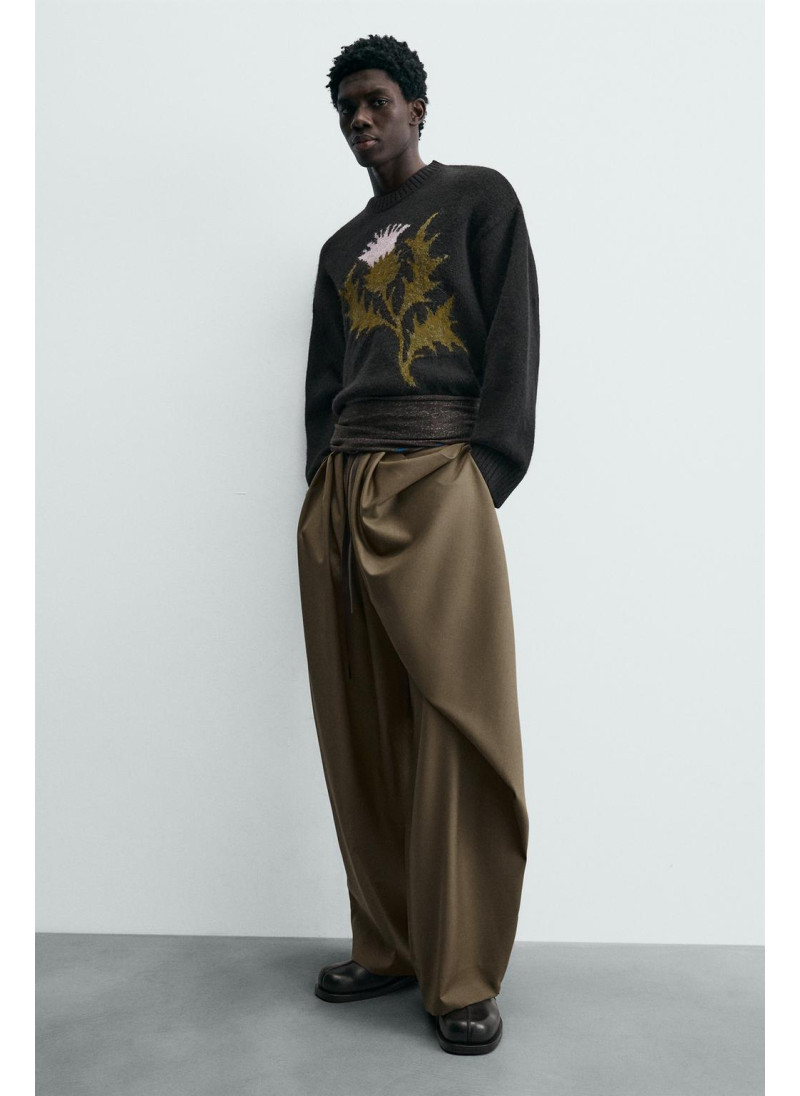 Лимитированная коллекция драпированных перекрещенных брюк Лимитированная коллекция драпированных перекрещенных брюк