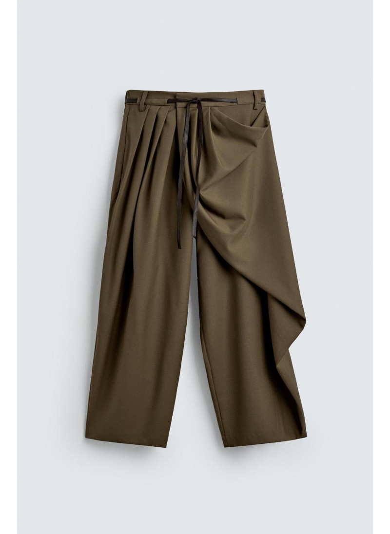 Лимитированная коллекция драпированных перекрещенных брюк Лимитированная коллекция драпированных перекрещенных брюк