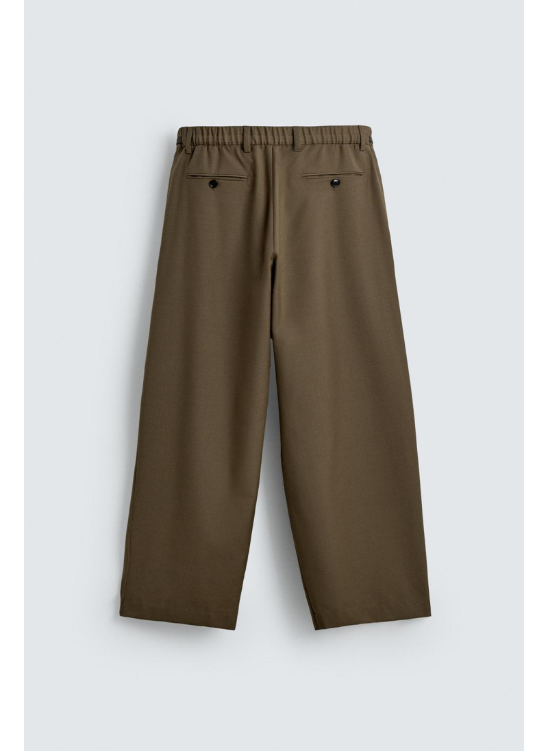 Лимитированная коллекция драпированных перекрещенных брюк Лимитированная коллекция драпированных перекрещенных брюк