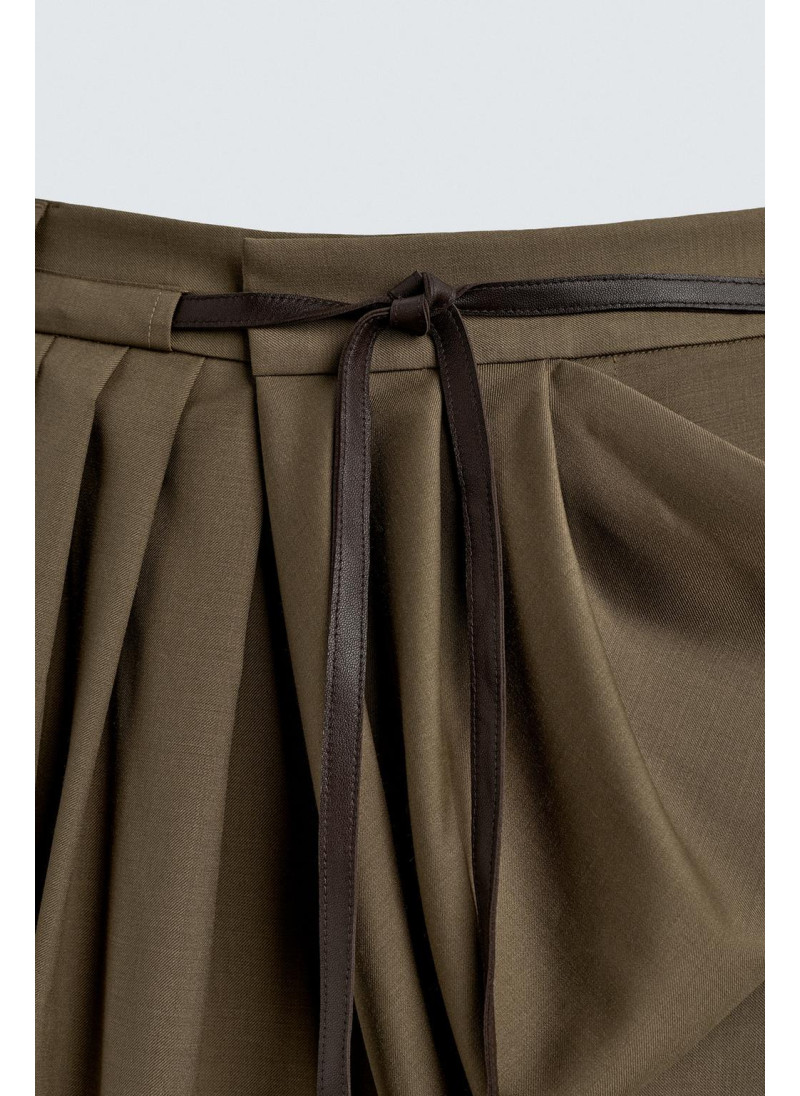 Лимитированная коллекция драпированных перекрещенных брюк Лимитированная коллекция драпированных перекрещенных брюк