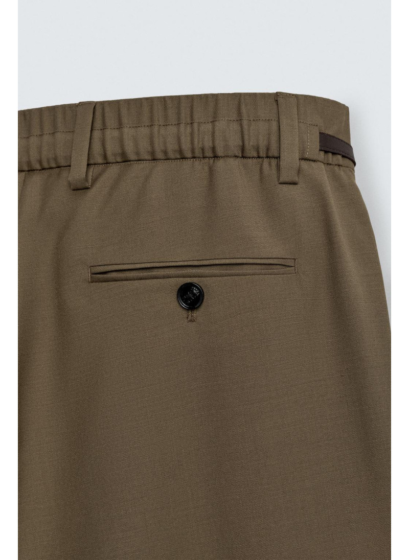 Лимитированная коллекция драпированных перекрещенных брюк Лимитированная коллекция драпированных перекрещенных брюк