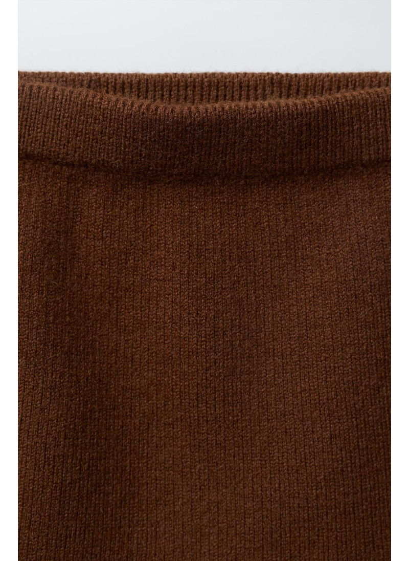 ТРИКОТАЖНАЯ ЮБКА СО СМЕСОВОЙ ШЕРСТЬЮ И БАНТАМИ ТРИКОТАЖНАЯ ЮБКА СО СМЕСОВОЙ ШЕРСТЬЮ И БАНТАМИ