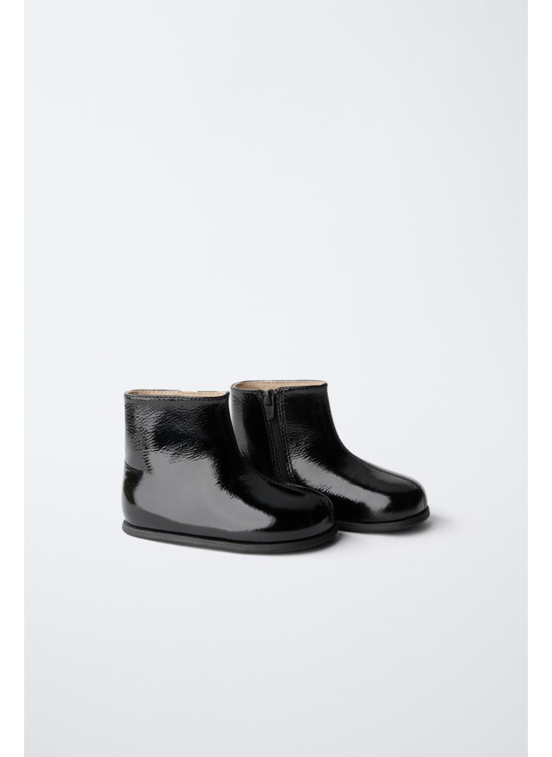 Кожаные сапоги с стежкой в клетку Кожаные сапоги с стежкой в клетку